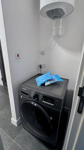 In-unit laundry with front-load washing machine